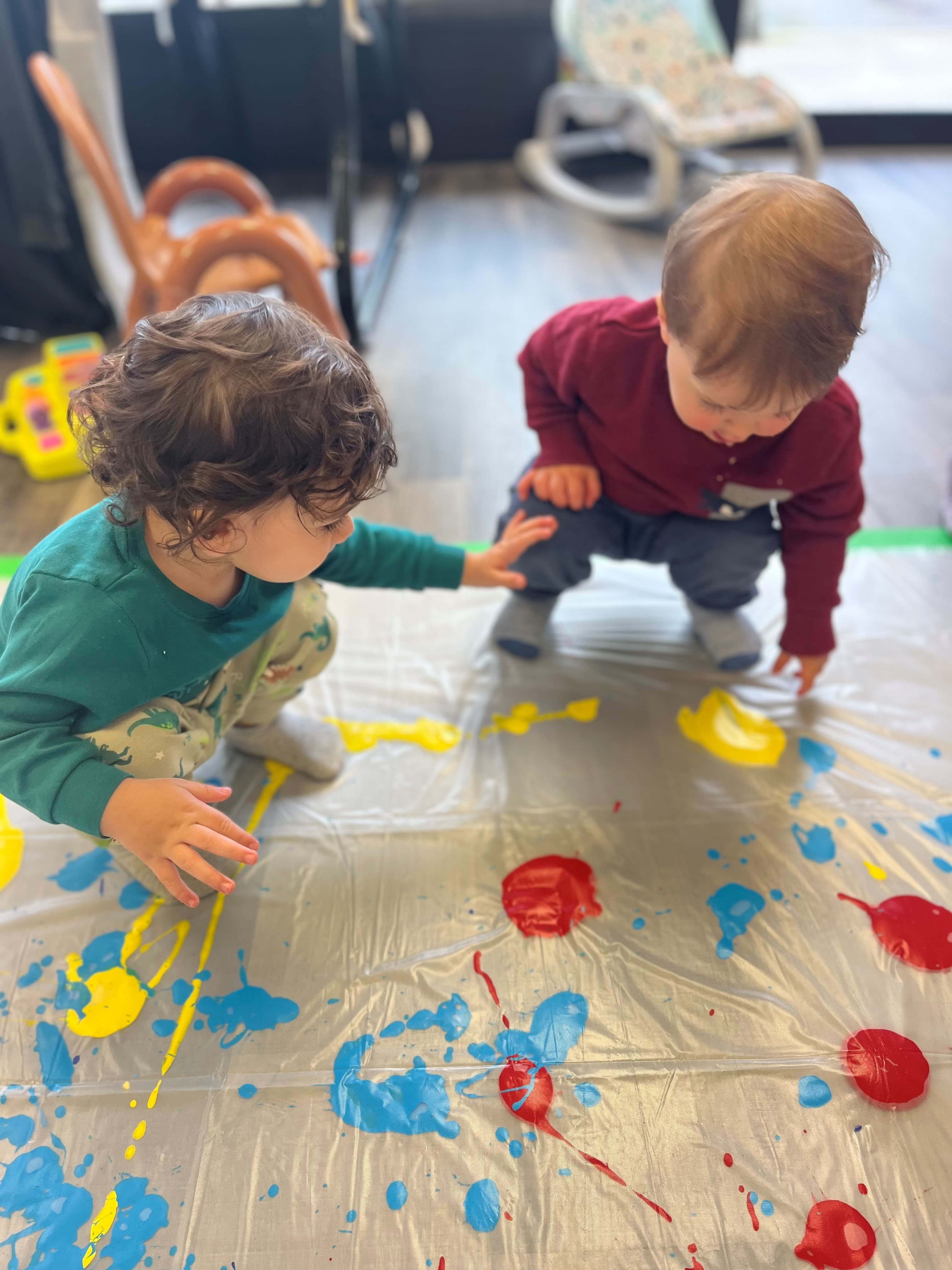 Children doing paint sensory play